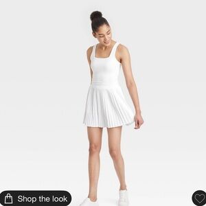 White Athletic Dress with Built-in Bra
Pit to pit 15’ to 17’ 
Length 32’